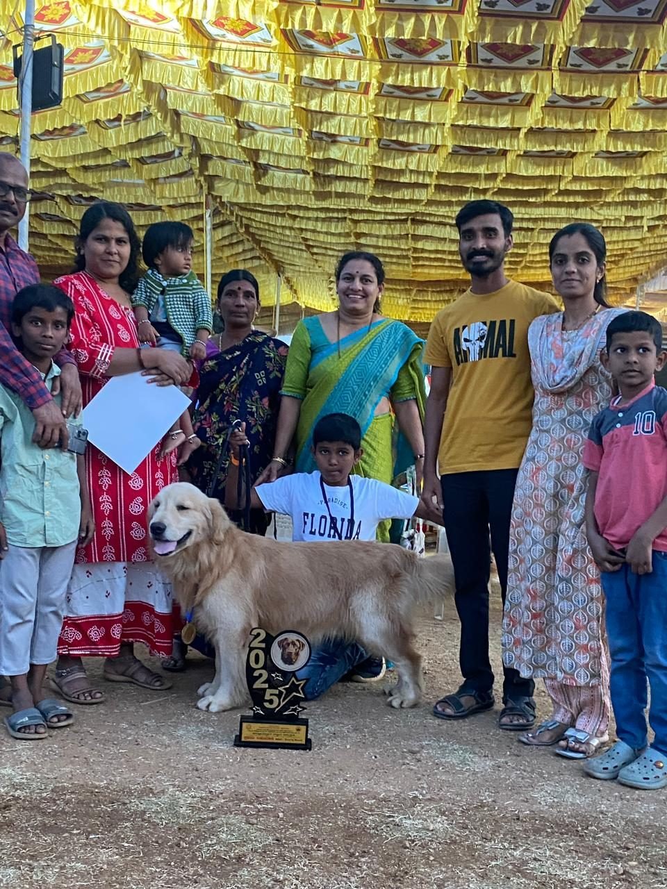Cimarron Kennel with a Golden Retriever at a community event